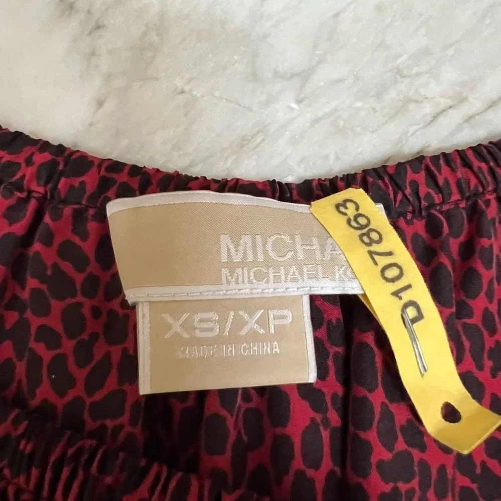 Michael Kors 100% Silk Peplum Long Sleeve Blouse Size Small loose fit
